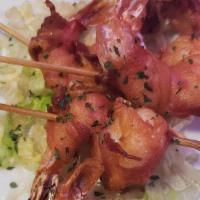 Honey Bacon Wrapped Shrimp · Four perfectly seasoned jumbo shrimp wrapped in sweet honey bacon. Served with an in-house p...