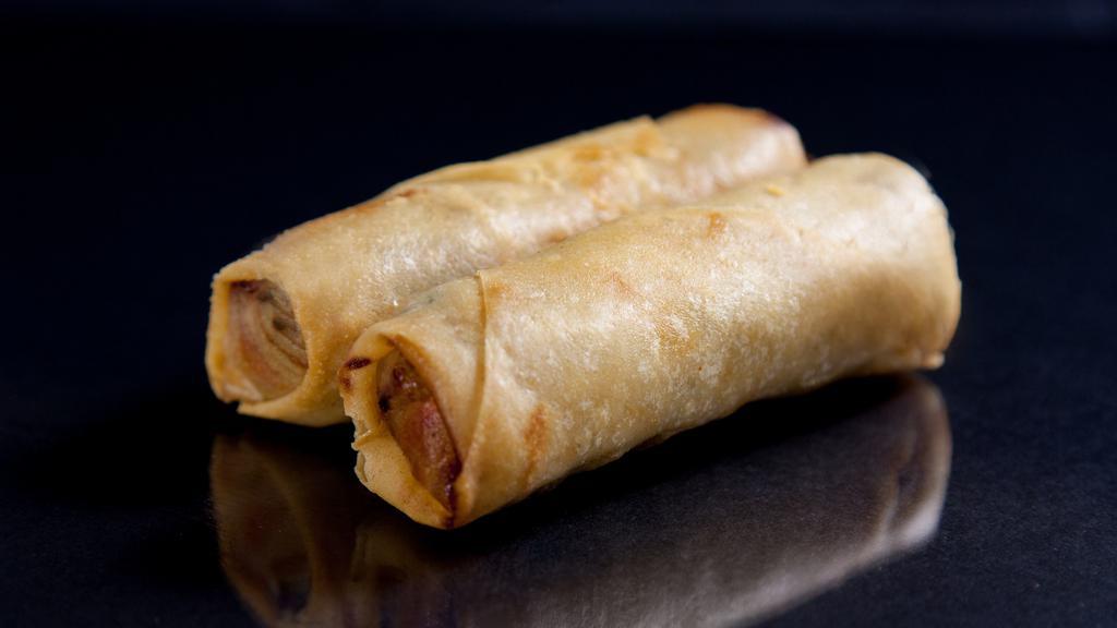 Crispy Spring Roll · Golden fried rice paper crêpe stuffed with vegetables, glass noodles and sweet chili sauce.