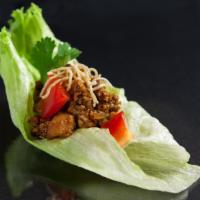 Lettuce Wrap · Ground chicken spiced with house sauce, shitake mushroom, water chestnuts and onion served w...