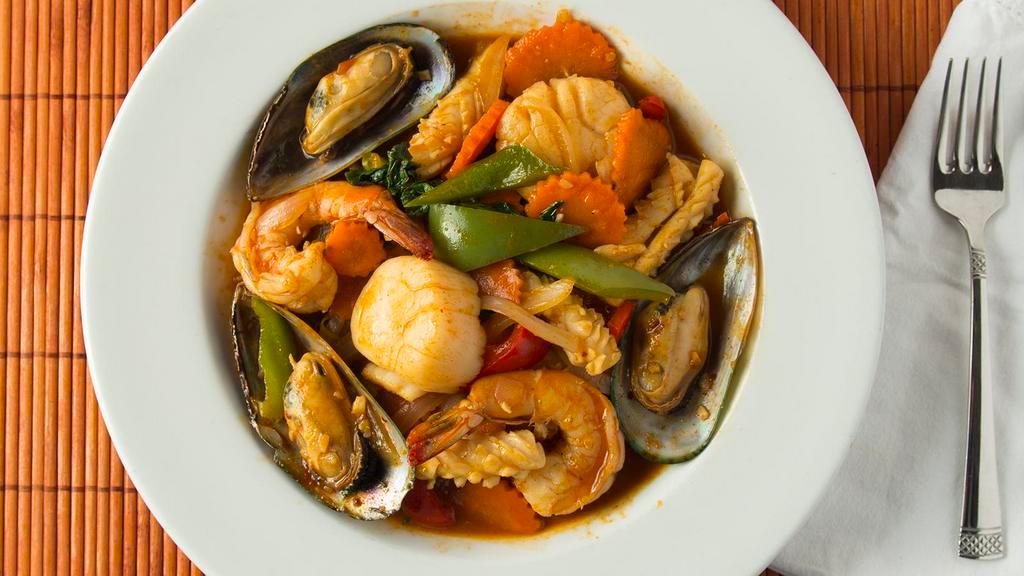 Spicilicious Seafood · Prawn, squid, mussel, scallop stir-fried with bell pepper, carrot, onion and basil in our special spicy chili garlic sauce.