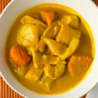 Yellow Curry · Mild yellow curry with coconut milk, potato, onion, carrot.