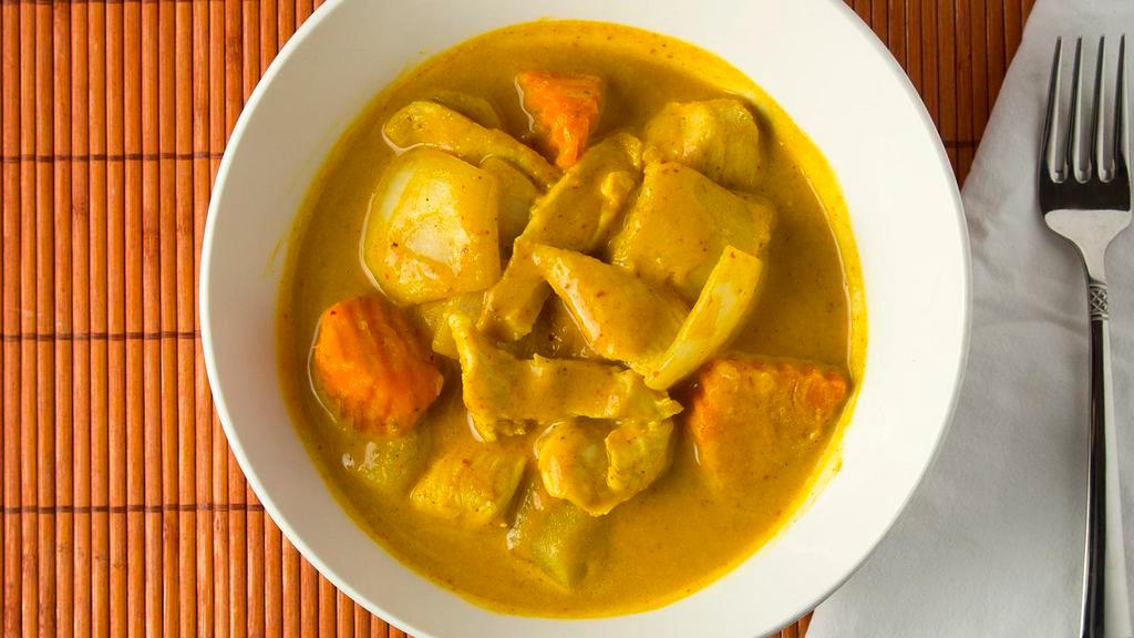 Yellow Curry · Mild yellow curry with coconut milk, potato, onion, carrot.
