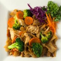 Pad See-Ew · Pan-fried thick rice noodles in dark sweet soy sauce with egg, broccoli and carrot.