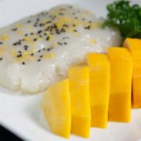 Sweet Rice With Mango · Sticky rice with coconut milk, crispy mung beans, black sesame seeds and Fresh Mango