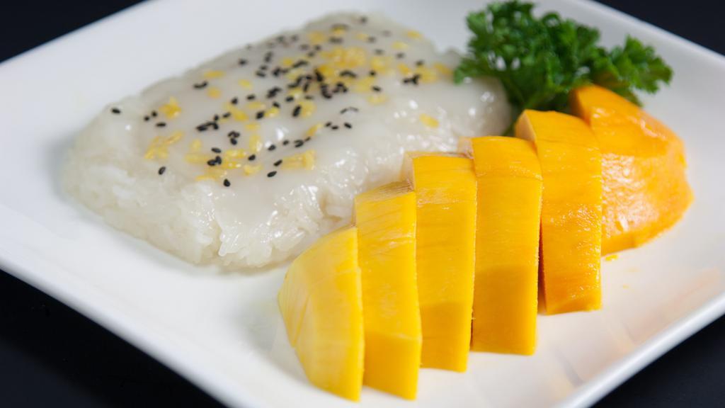 Sweet Rice With Mango · Sticky rice with coconut milk, crispy mung beans, black sesame seeds and Fresh Mango