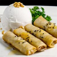 Crispy Banana With Ice Cream · Your choice of Coconut or Thai Tea Ice Cream