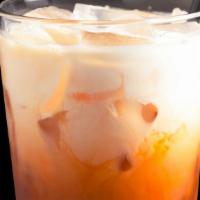 Thai Iced Tea · Fresh brew Thai tea with half&half