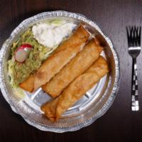 Taquitos Acapulco · Three shredded beef or chicken taquitos served with guacamole and sour cream.