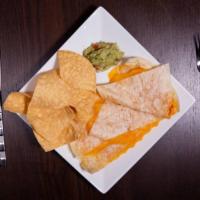 Quesadilla Clasica · A large flour tortilla filled with Jack and Cheddar cheese served with guacamole or sour cre...