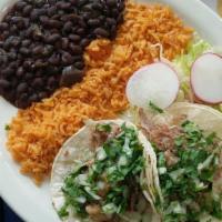 Two Soft Tacos · Steak or chicken. Extra with shrimp, fish or carnitas.