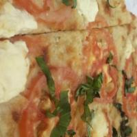 Tomato & Garlic · Mozzarella and ricotta cheese, tomato slices, garlic, fresh basil, infused olive oil, parmes...