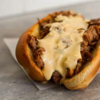 Philly Cheesesteak · Your choice of grilled chicken or philly steak with grilled bell peppers and onions, mozzare...