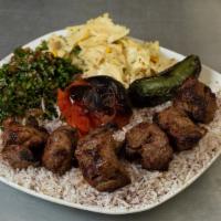Lamb Leg Meat Kabob Plate · All plates come with your choice of three sides, pita bread, and roasted tomato or jalapeno.