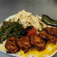 Chicken Leg Meat Kabob Plate · All plates come with your choice of three sides, pita bread, and roasted tomato or jalapeno.