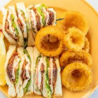 Turkey Club · Oven roasted turkey breast, applewood smoked bacon, lettuce, tomato and mayo, served on toas...