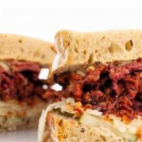 #8 Hot Pastrami Sandwich · Hot pastrami, coleslaw, dill pickles, and whole grain mustard sauce on our freshly baked rye...