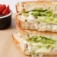 Famous Tuna Salad · White albacore tuna, chopped eggs, sweet onions,. Ms. Polly’s Special recipe seasonings, rel...