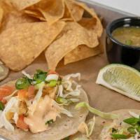 Fish Tacos · Choose beer-battered fried or grilled cod, shredded. cabbage, tomato, cilantro, green onion,...
