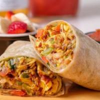 Polly'S Breakfast Burrito · Extra large flour tortilla stuffed with bacon or. sausage, scrambled eggs, hashbrowns, peppe...