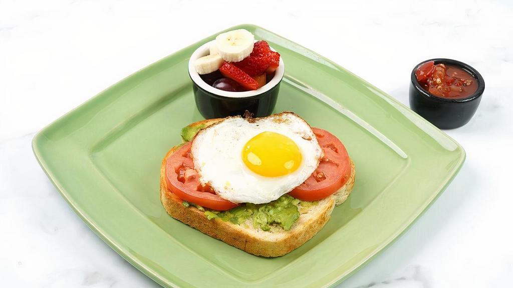 Avocado Toast W/ Egg · Our freshly baked toasted sourdough bread with. smashed avocado, sliced tomato, an egg, and our. salsa.