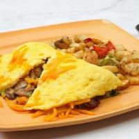 B.C. Omelette · Acocado, cherrywood smoked bacon, cheddar cheese, mushrooms and green onions