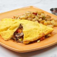 Vegetable Omelette · A blend of seasonal garden vegetables and melted cheese. drizzled with Ms. Polly's special s...