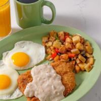 Chicken Fried Steak & Eggs · Chicken fried steak smothered in country gravy and. served with two large eggs, your choice ...