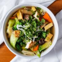 Vegetarian Pho · Served with white tofu, straw mushroom, baby corn, celery, carrot, broccoli and baby bok cho...