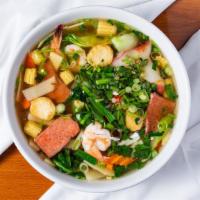 Seafood Rice Noodle Soup · Shrimp, lobster ball, fish ball, calamari imitation crab and mixed vegetable