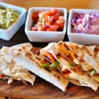 Shrimp Quesadilla · Hearty prawns and creamy cheese served between flour tortillas with a side salad.