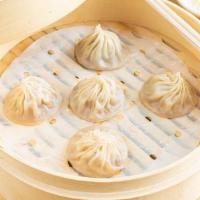 Spicy Pork Xiao Long Bao · five (5) pieces of pork xiao long bao.  served with ginger and vinegar.
(handmade and delica...