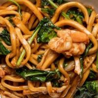 Vegetable Dan Mein Noodles · handmade thick noodles with broccoli, snow pea leaves, shitake mushrooms, garlic and our sig...