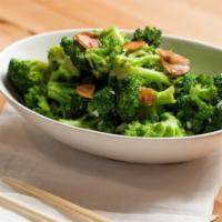 Sautéed Broccoli With Garlic · broccoli sautéed with garlic and topped with sliced garlic crisp
