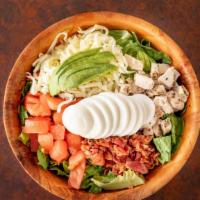 Cobb Salad · Romaine lettuce topped with chicken, tomatoes, bacon, cheese, boiled egg and avocado.