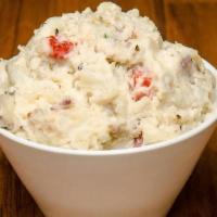 Potato Salad · Red (skin on) Potatoes - roasted Garlic -Jalapenos - Red Bell Pepper - Cilantro