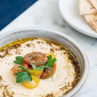 Lebanese Hummus · campari tomato, garden herbs, za’atar, warm pita. Vegan.