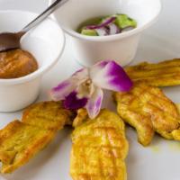 Satay Chicken · Healthy. Chicken marinated with Thai herbs and grilled to perfection served with homemade pe...