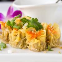 Thai Dumpling (Kanom Jeeb) · Steamed dumplings stuffed with pork, shrimp, chicken, water chestnut and Thai herbs. Served ...