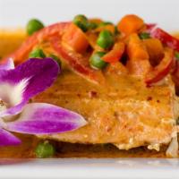 Panang Salmon Curry · Healthy, spicy. Grilled salmon with panang curry in coconut milk with peas, carrot and kaffi...