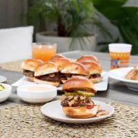 Slider Box - Family Meal  · 9 build-your-own mini burgers with Island Reds, caramelized onions, 1000 island dressing, pi...