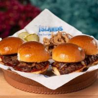 Beachside Sliders  · Four mini burgers with caramelized onions & ketchup. Served with Island Reds & pickles.