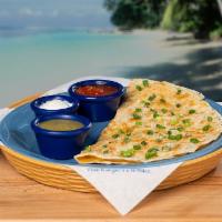 Quesadilla  · Flour Tortilla stuffed with cheddar, jack, green chiles & topped with scallions. Served with...