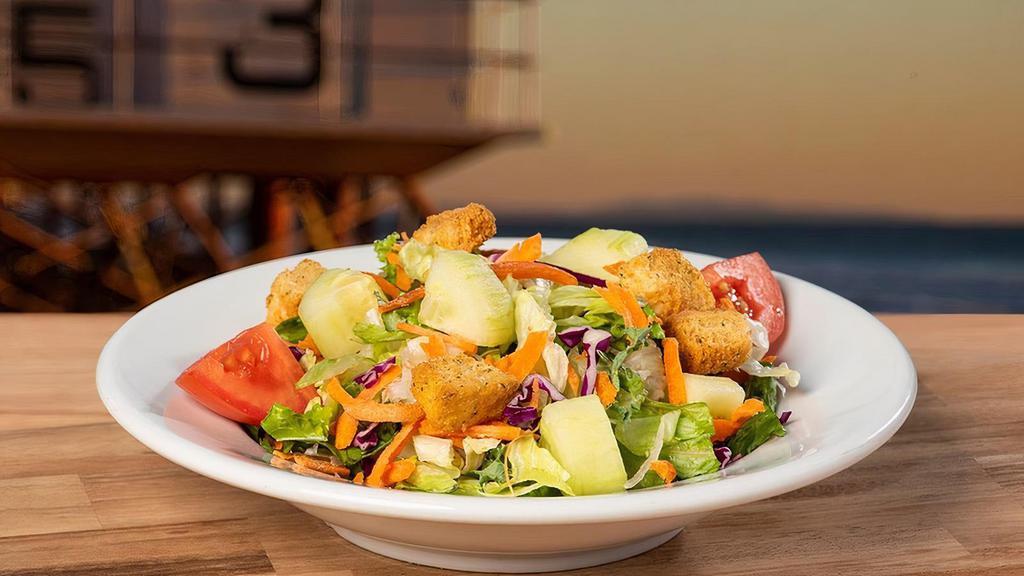 Small Garden Salad  · Mixed greens, shredded carrots, croutons, tomato & cucumbers. Served with your choice of dressing.