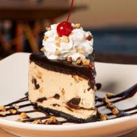 Kona Pie  · Perfect for sharing! Mocha almond fudge ice cream & cookie crust topped w/chocolate fudge, r...