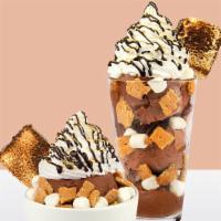 S'Mores · Chocolate ice cream with layers of crushed graham crackers, mini marshmallows, and chocolate...