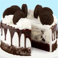 Cookies & Cream Ice Cream Cake · Cookies & Cream ice cream and chocolate cake frosted in fresh cream, drizzled with chocolate...