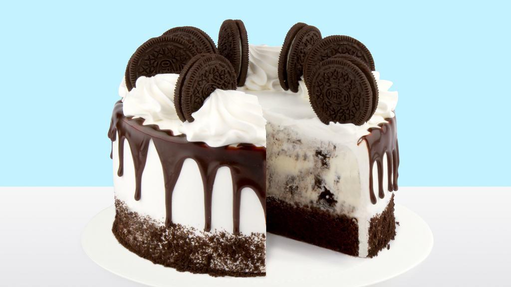 Cookies And Cream · Cookies & Cream ice cream and chocolate cake frosted in fresh cream, drizzled with chocolate, and topped with Oreo® cookies.