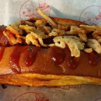Bbq Cheddar Brat · Smoked Bratwurst-Bacon Wrapped-Stuffed with Cheddar Cheese-Topped with BBQ Sauce &  Crispy O...