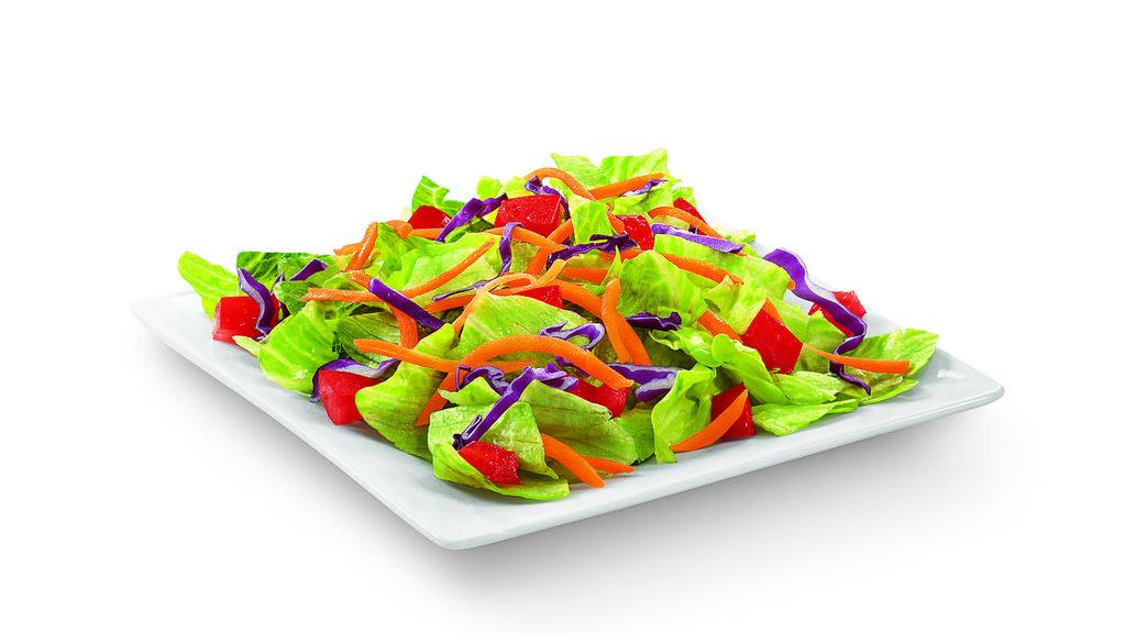 Side Salad · Fresh lettuce topped with diced tomatoes and shredded carrots and cabbage; available with your choice of dressing.