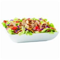 Grilled Chicken Blt Salad · Served with Marzetti® dressing and topped with grilled chicken, chopped tomatoes, crispy bac...